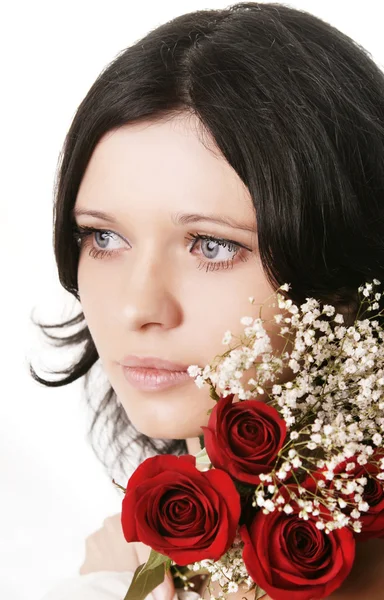 Beautiful brunette girl with a rose — Stock Photo, Image