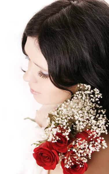 Bella ragazza bruna con una rosa — Foto Stock