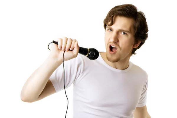 Man who sings in the microphone — Stock Photo, Image