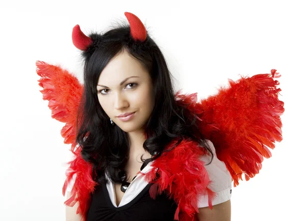 Menina em um traje do diabo com um presente — Fotografia de Stock