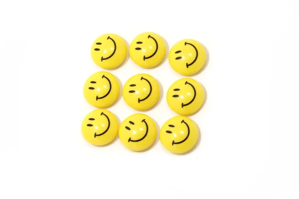Группа жёлтых улыбок — стоковое фото