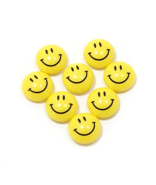 Heart made of yellow smileys — Stock Photo, Image