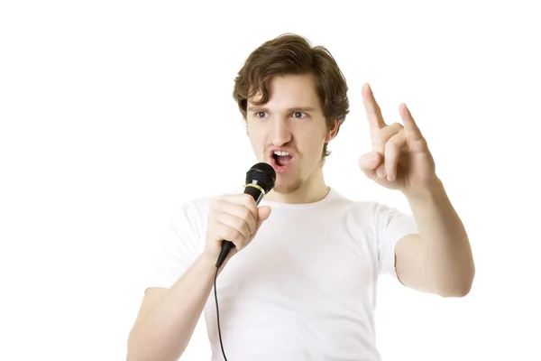 Homem que canta no microfone — Fotografia de Stock