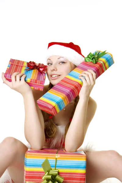 Santa ragazza con regali su sfondo bianco — Foto Stock
