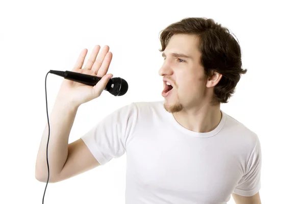Homem que canta no microfone — Fotografia de Stock