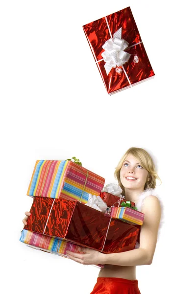 Santa meisje met presenteert op witte achtergrond — Stockfoto