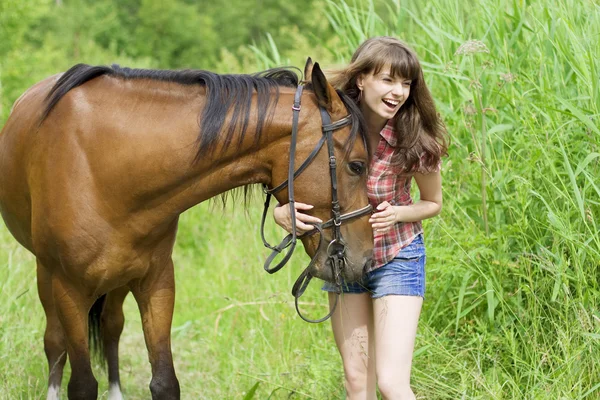 Brunette girl with horse — Stock Photo, Image