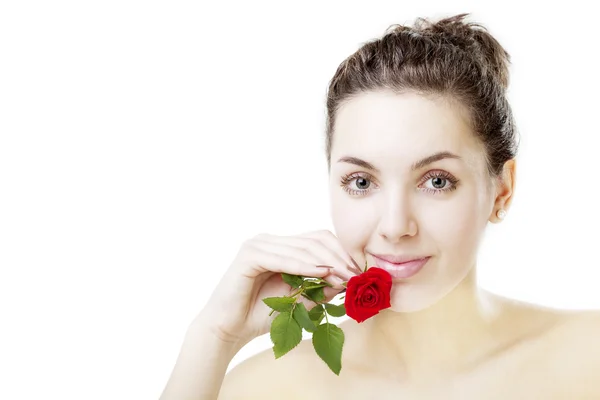 Mooi meisje met een roos — Stockfoto