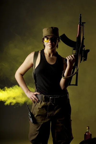 Girl soldiers in the smoke — Stock Photo, Image