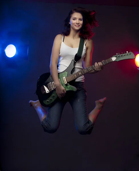 Красива дівчина з гітарою Стокова Картинка