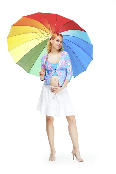 Piękne dziewczyny w ciąży z parasolem tęcza — Zdjęcie stockowe