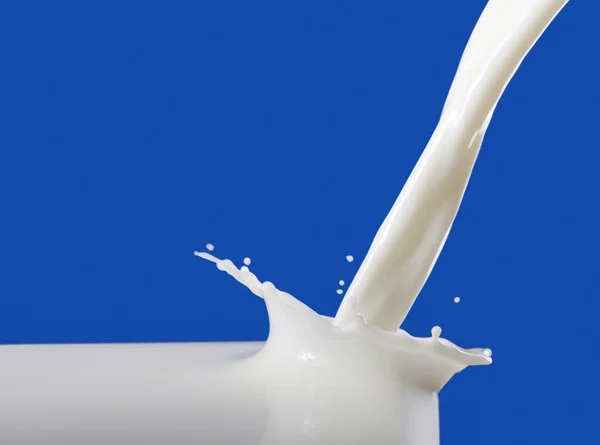 Šplouchnutí mléka Stock Snímky