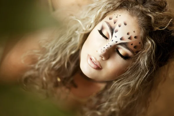 Luxury girl, like a leopard Royalty Free Stock Images