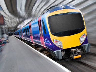 Fast Modern Passenger Train with Motion Blur clipart