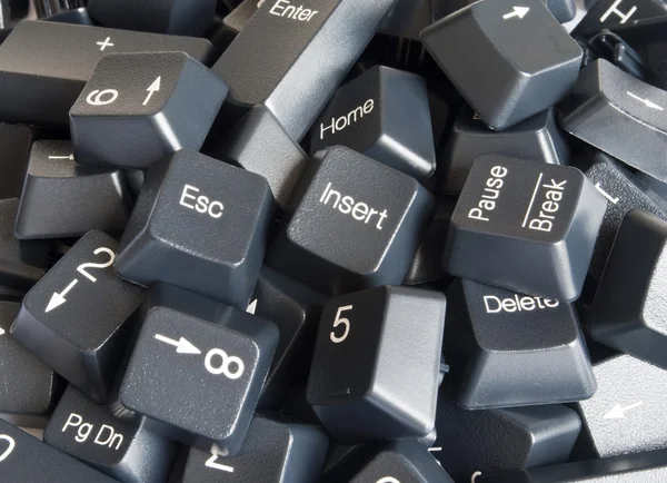 Pilha de teclas de teclado do computador preto — Fotografia de Stock