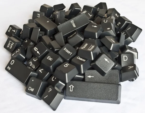 Pilha de teclas de teclado do computador preto — Fotografia de Stock