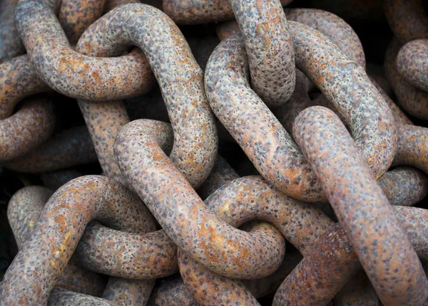 Closeup on a pile of old rusty ship chain — Stock Photo, Image