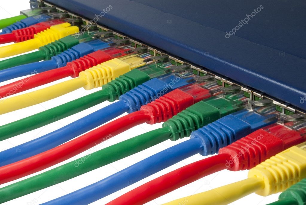 Multi colored ethernet network cables connected to a router
