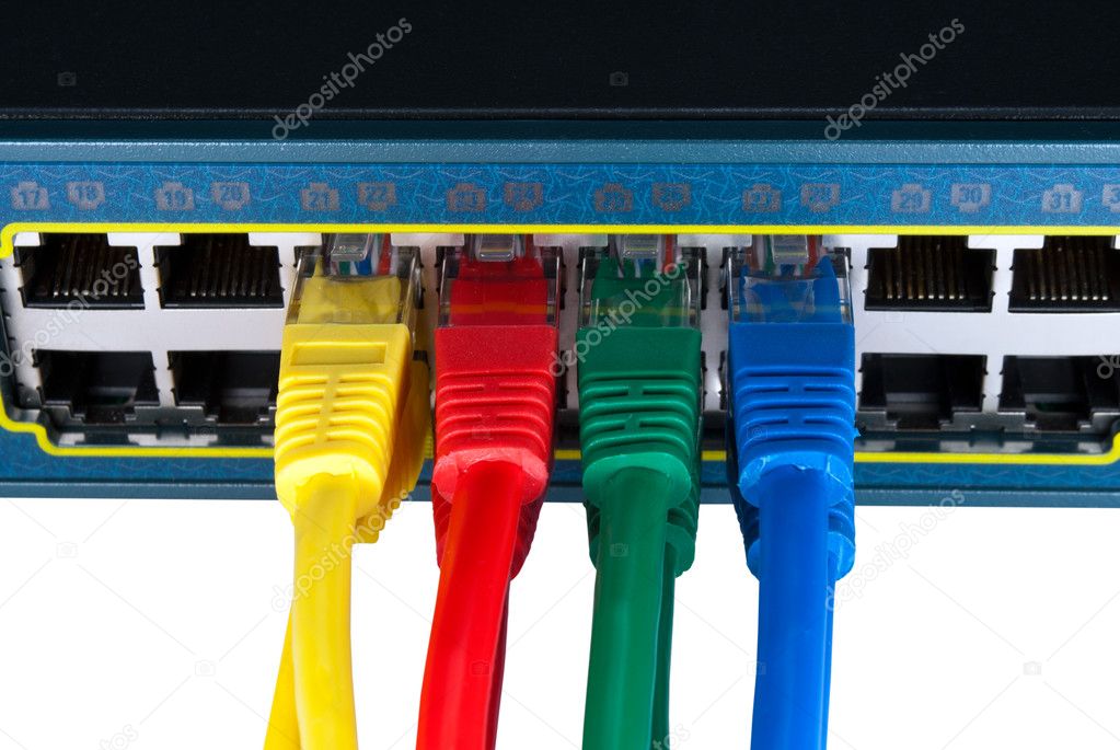 Colored Network Cables Connected to Switch Isolated