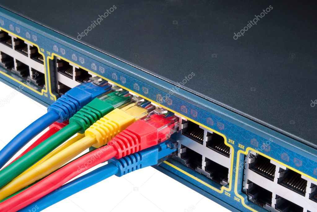 Colored Ethernet Network Cables Connected to Switch Isolated