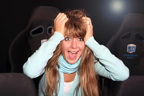 stock image One young girl watching movie in cinema