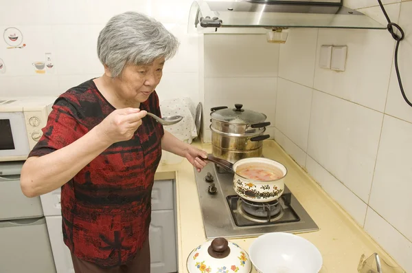 Cooking grandma — Stock Photo, Image