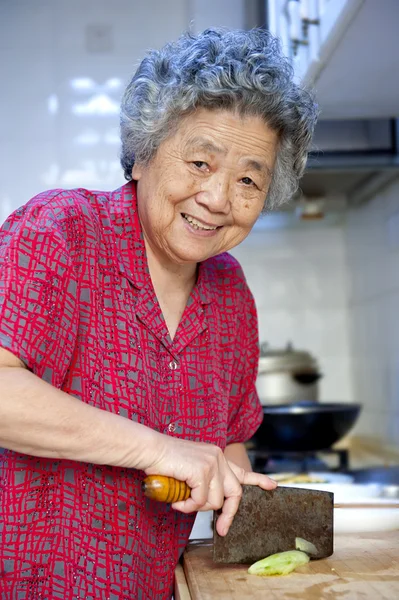 Cooking grandmother — Stock Photo, Image