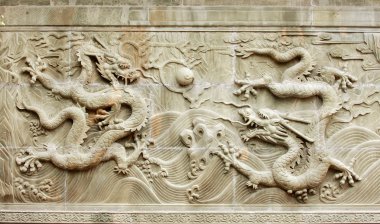 Dragon's relief sculpture clipart