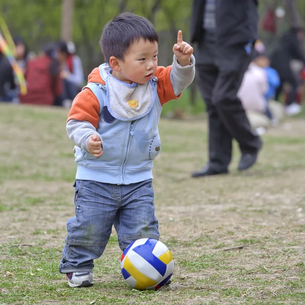 Baby playing football — Stock Photo, Image