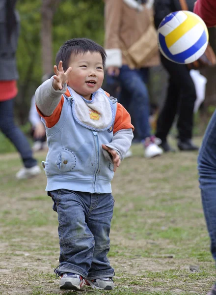 Baby playing football — Stock Photo, Image