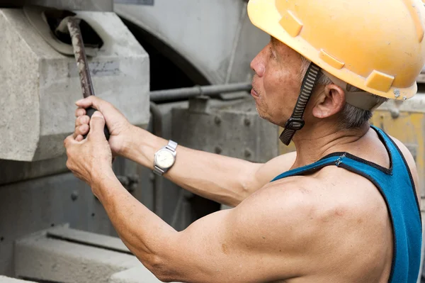 stock image Hardworking laborer on construction site
