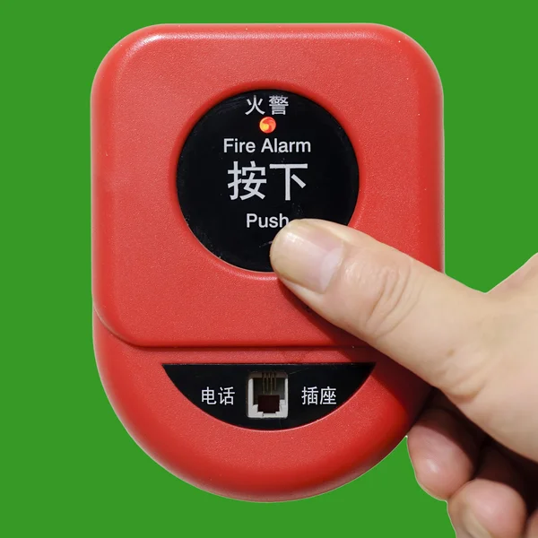 stock image Press fire alarm button with isolated background