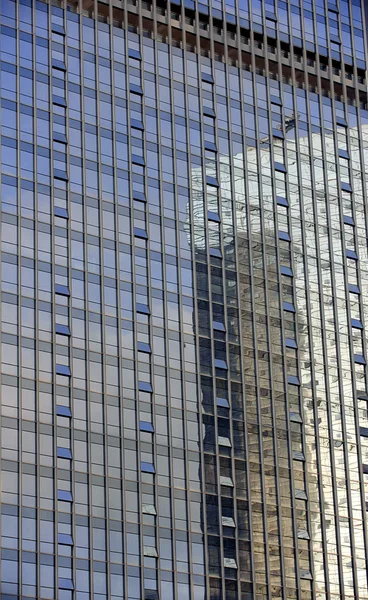 Mirror image of a building in the mirror — Stock Photo, Image
