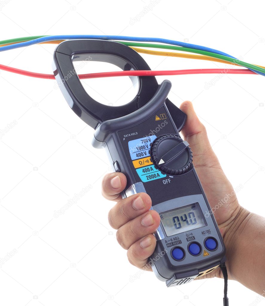 Man hand hold AC and DC clamp meter