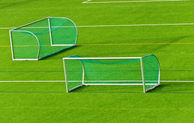 Football goals on football field clipart