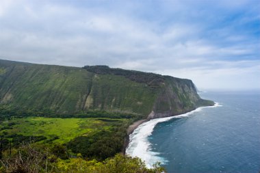 Waipio valley, Big Island, Hawaii with coast line of Pacific ocean. clipart