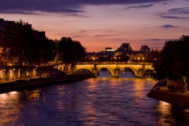 Paris view of the river Seine a sunset clipart