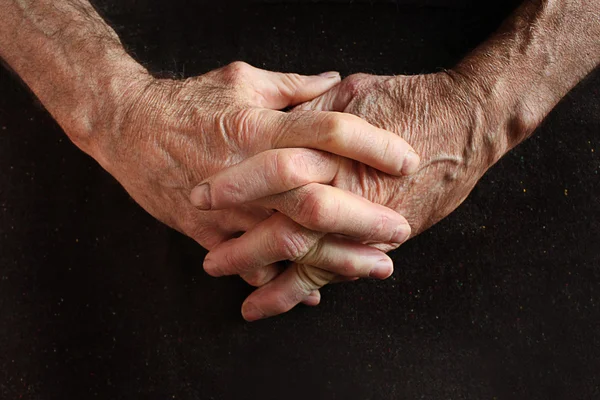 Interlaced fingers of old man — Stock Photo, Image