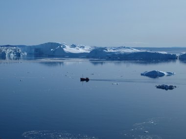 Fishing boat in Ilulissat Icefjord, clipart