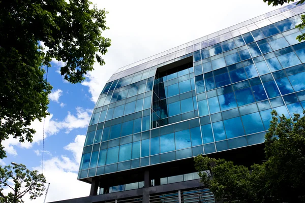 Stock image Glass office building