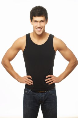 Young caucasian smiling handsome athletic man showing muscle happy clipart