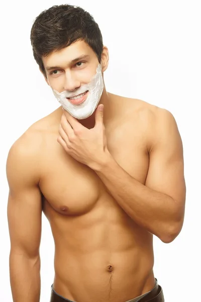 Портрет улыбающегося красивого успешного бритья человека, изолированного на белом — стоковое фото