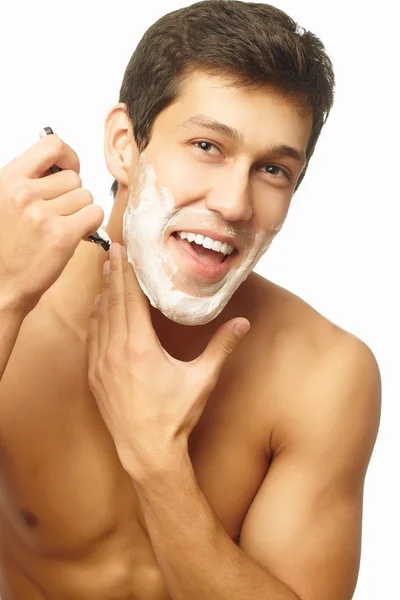 Портрет улыбающегося красивого успешного бритья человека, изолированного на белом фоне — стоковое фото