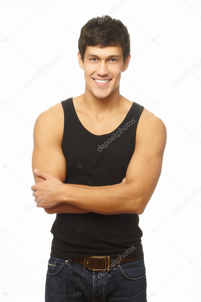 Portrait of a handsome young man with great physique posing