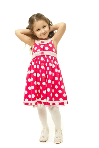 Portrét hezká holčička v růžových šatech — Stock fotografie