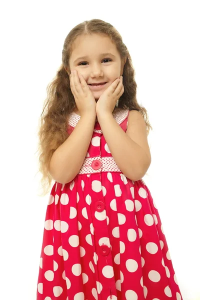 Portret van een vrij klein meisje in roze jurk — Stockfoto
