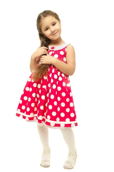 Портрет красивой маленькой девочки в розовом платье — стоковое фото
