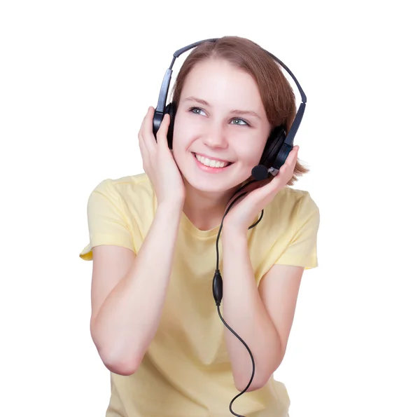 Happy young woman wearing headset Stock Photo