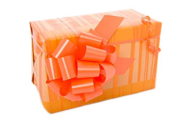 Yellow christmas gift box with bow — Stock Photo, Image