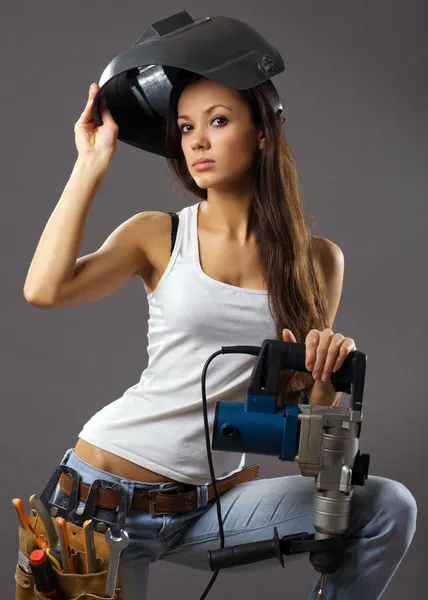 Sexig ung kvinna byggnadsarbetare — Stockfoto
